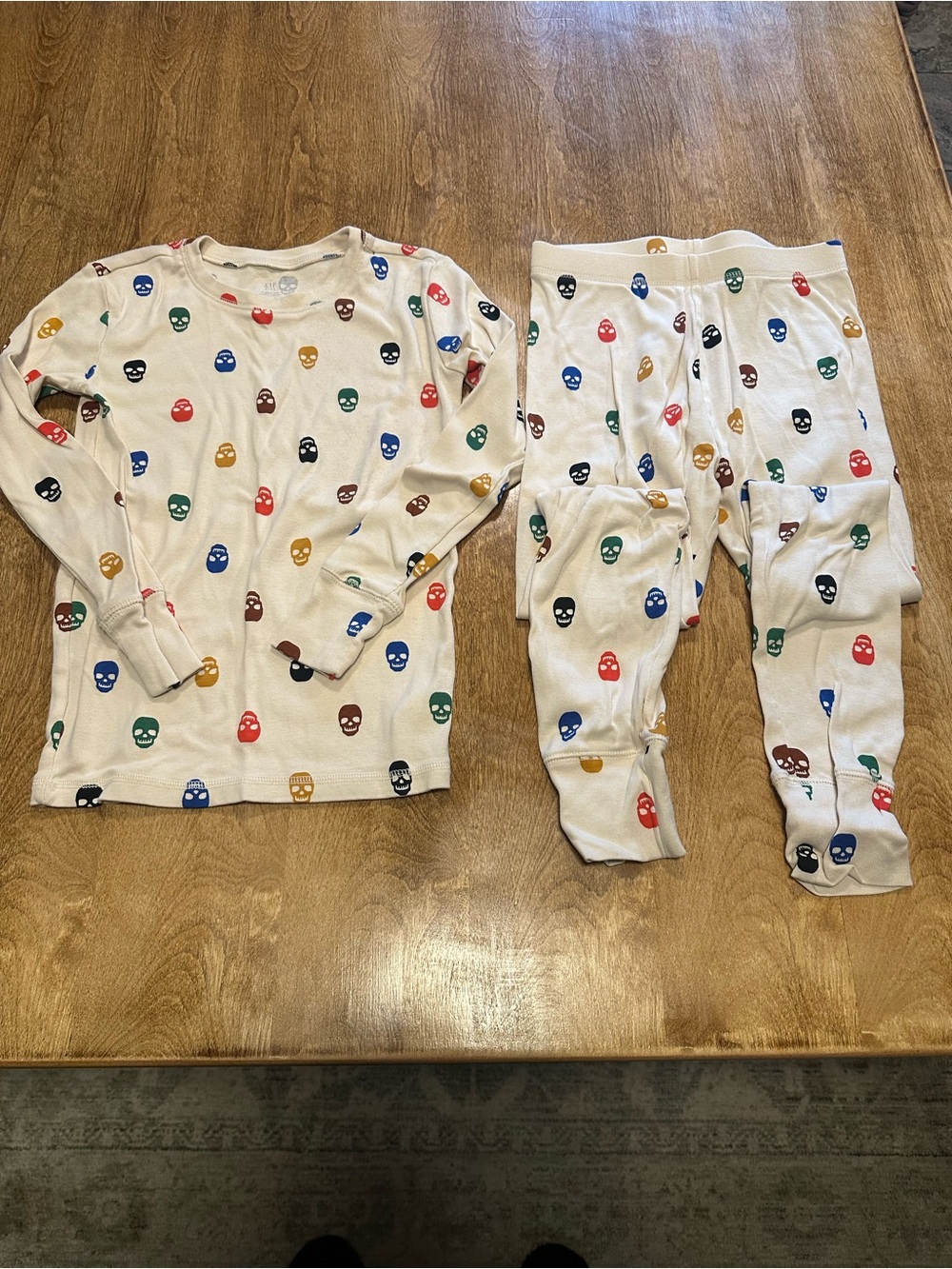 GAP Cream Kids Two-Piece Pajama Set with Multicolor Skull Prints